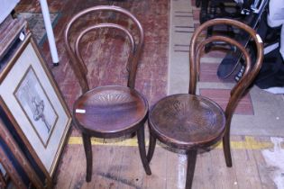 A pair of early 20th century children's bentwood bistro chairs. Shipping unavailable