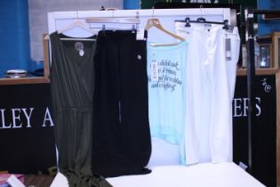 four pieces of new ladies clothing with tags