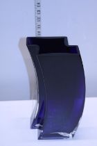A stylish blue art glass vase