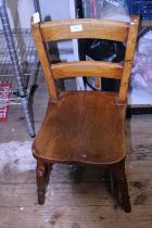 A antique child's elm chair. Shipping unavailable