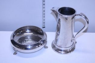A large silver plated jug and footed bowl