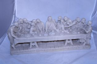 A heavy resin last supper figural group L42cm