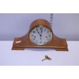 A vintage Franz Hermle mantle clock with key in working order