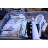 Twenty five wii games with three controllers, skylanders figures and other
