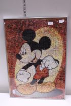 A framed Mickey Mouse jigsaw puzzle 70x50cm, shipping unavailable