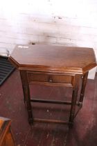 A dark oak hall table with single drawer, shipping unavailable