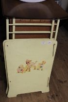 A vintage dolls cot