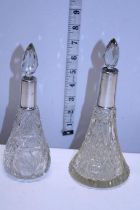 Two hallmarked silver collared perfume bottles