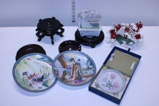 A job lot of Oriental collectables including rosewood vase stands