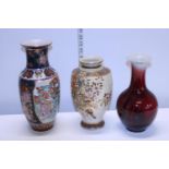 Three Oriental ceramic vases largest h32cm