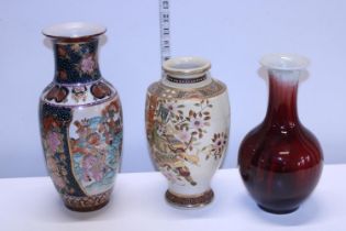Three Oriental ceramic vases largest h32cm
