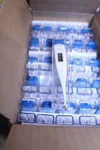 A box of fifty new digital thermometers