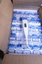 A box of fifty new digital thermometers