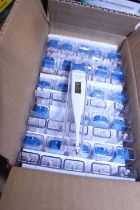 A box of fifty new digital thermometers