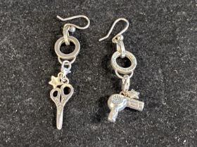 A pair of 925 silver earrings in the form of a pair of scissors and hairdyer