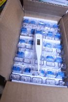 A box of fifty new digital thermometers