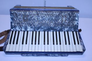 A vintage Hohner Verdi III accordion in case, shipping unavailable