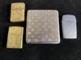Three assorted Zippo lights and a vintage cigarette case