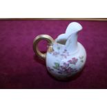 A Royal Worcester blush ivory hand painted jug with initials S. H to base
