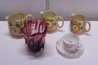 A job lot of assorted ceramics including a moustache cup and art glass vase