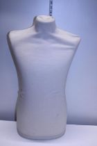 A vintage mannequin torso