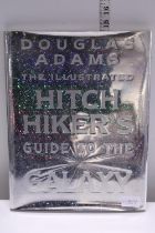 A hardback book by Douglas Adams 'The Illustrated Hitchhikers Guide to the Galaxy'