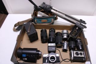 A selection of assorted vintage cameras and accessories