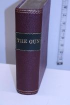 A antique hardback book entitled 'The Gun' dated 1887