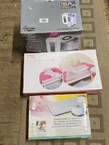 Three boxed baby products, untested