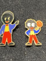 Two collectable Robertson's enamel badges