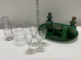 A selection of antique assorted glassware including a green glass dressing table set