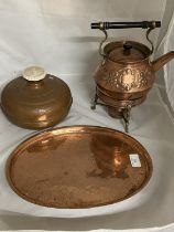 A selection of copperware including kettle with burner