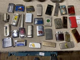 A job lot of assorted branded collectible lighters