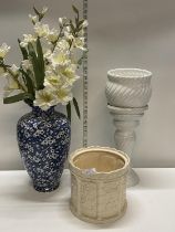 A blue and white vase and artificial flowers and two ceramic planters. Collection only