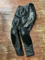 A pair leather triumph trousers size S