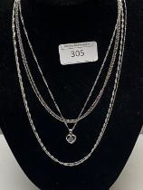 Five 925 silver chains one with pendant