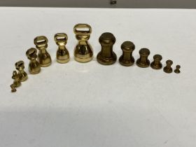 A selection of brass weights