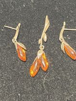 A pair of 925 and Amber earrings and 925 silver and Amber pendant