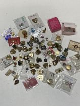 A large job lot of assorted pin badges