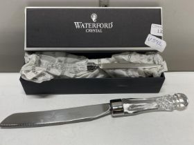 A boxed Waterford Crystal letter opener and a unboxed Waterford Crystal cake knife