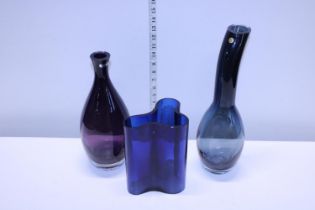 Three pieces of blue art glass (two with nibbles)
