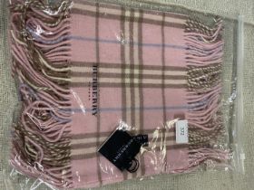 A new with tags Burberry 100% lambs wool pink long scarf with double tassels 150 x 37cm