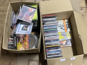 Two boxes of mixed genre CD's and PS games