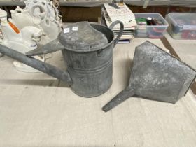 A vintage galvanised watering can and funnel. Collection only