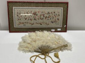 A vintage framed Chinese silk and a vintage feather fan