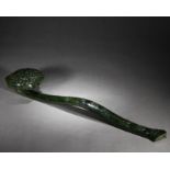 A Chinese Carved Spinach Green Jade Ruyi Scepter
