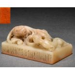 A Chinese Carved Soapstone Chilong Seal