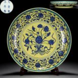 A Chinese Yellow Ground and Underglaze Blue Lotus Bouquet Dish