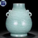 A Chinese Celadon Glaze Dragon Jar