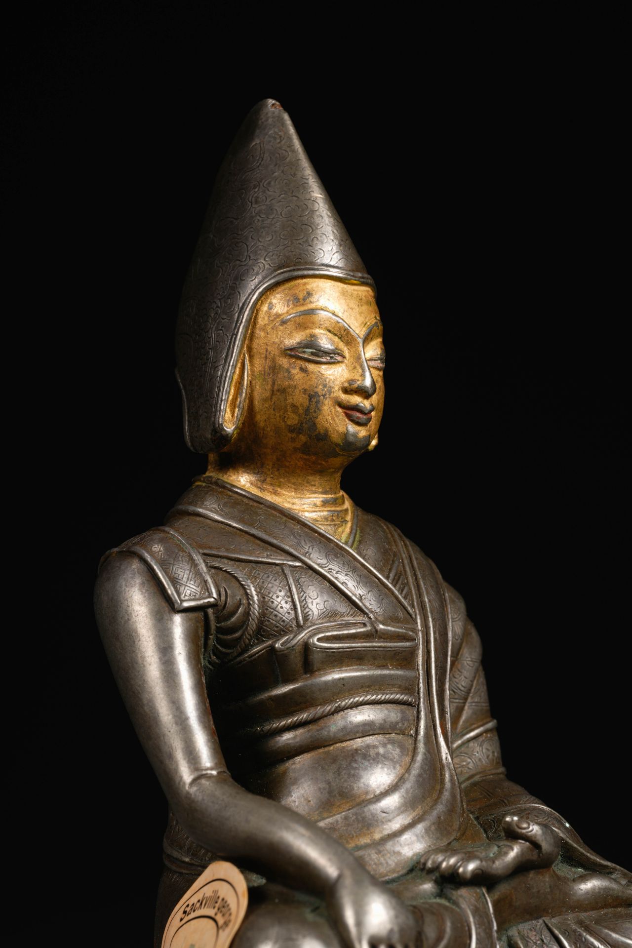 A Tibetan Bronze-gilt Seated Lama - Image 4 of 9